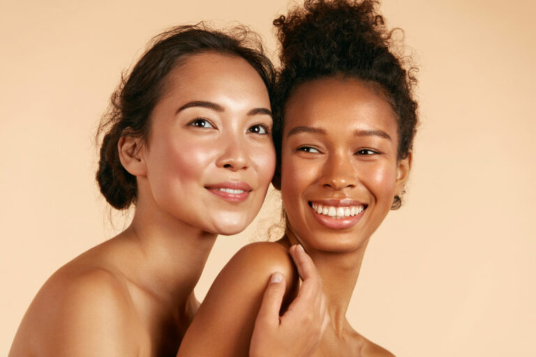 two women hugging feeling healthy and hydrated