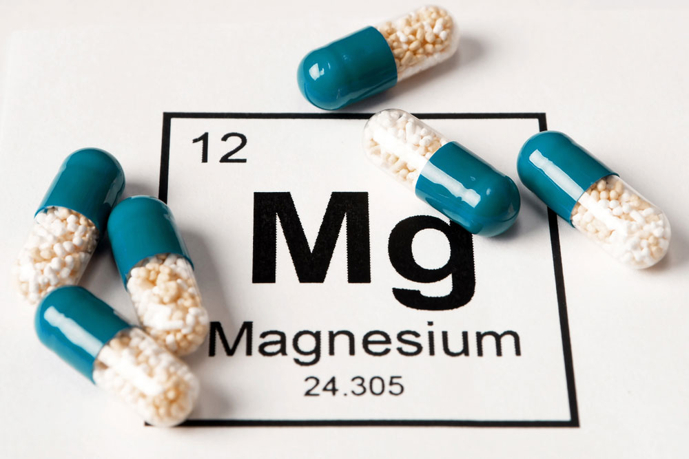 magnesium pills over the element sign