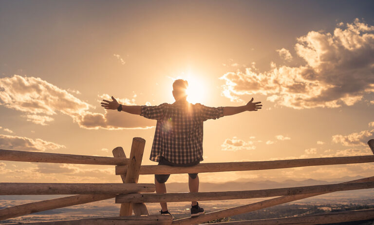 man feeling energized at sunrise from injectable vitamins