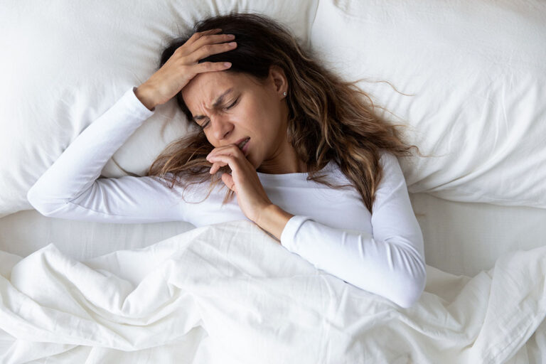 girl with hangover seeking iv therapy for hangover relief