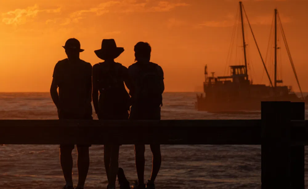sunset-silhouettes-boat